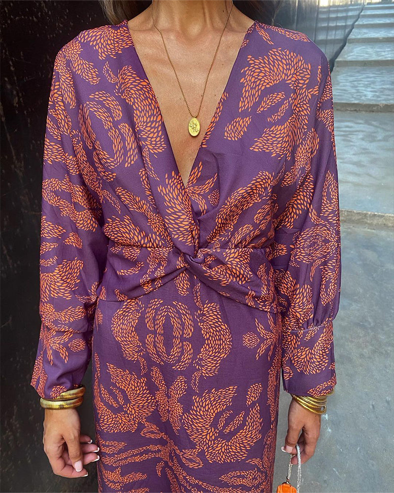 LD | Elegante vintage jurk met V-hals en lange mouwen.