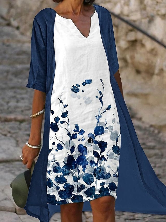 LD | Tweedelige midi-jurk met blauwe bloemenprint en elegante halve mouwen