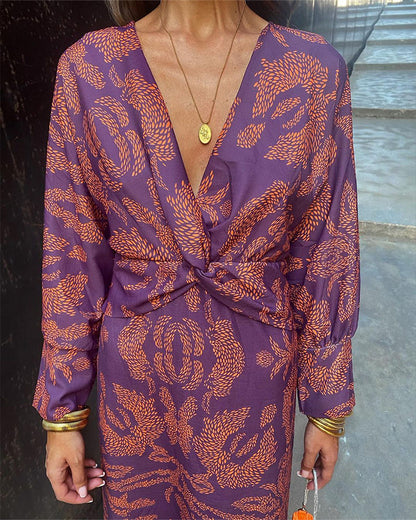 LD | Elegante vintage jurk met V-hals en lange mouwen.