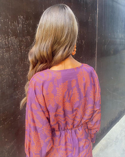 LD | Elegante vintage jurk met V-hals en lange mouwen.