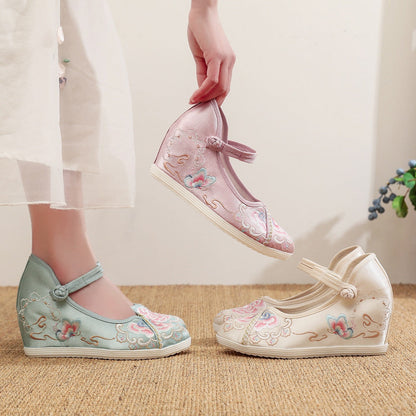 LD | Elegante geborduurde sleehakken