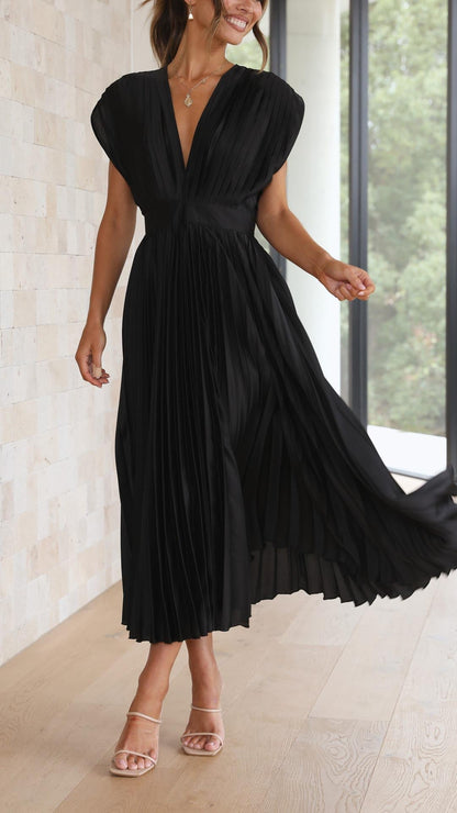 LD | Elegante geplooide jurk met een luxueuze glans