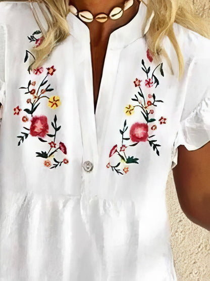 LD | Mini jurk met V-hals en franjes in bloemenprint